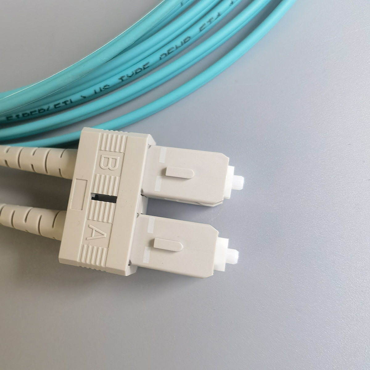 LC/UPC-SC/UPC OM3 LSZH Multi-Mode Double Core FTTH 3M 1.8mm Fiber Optic Extension Cable 