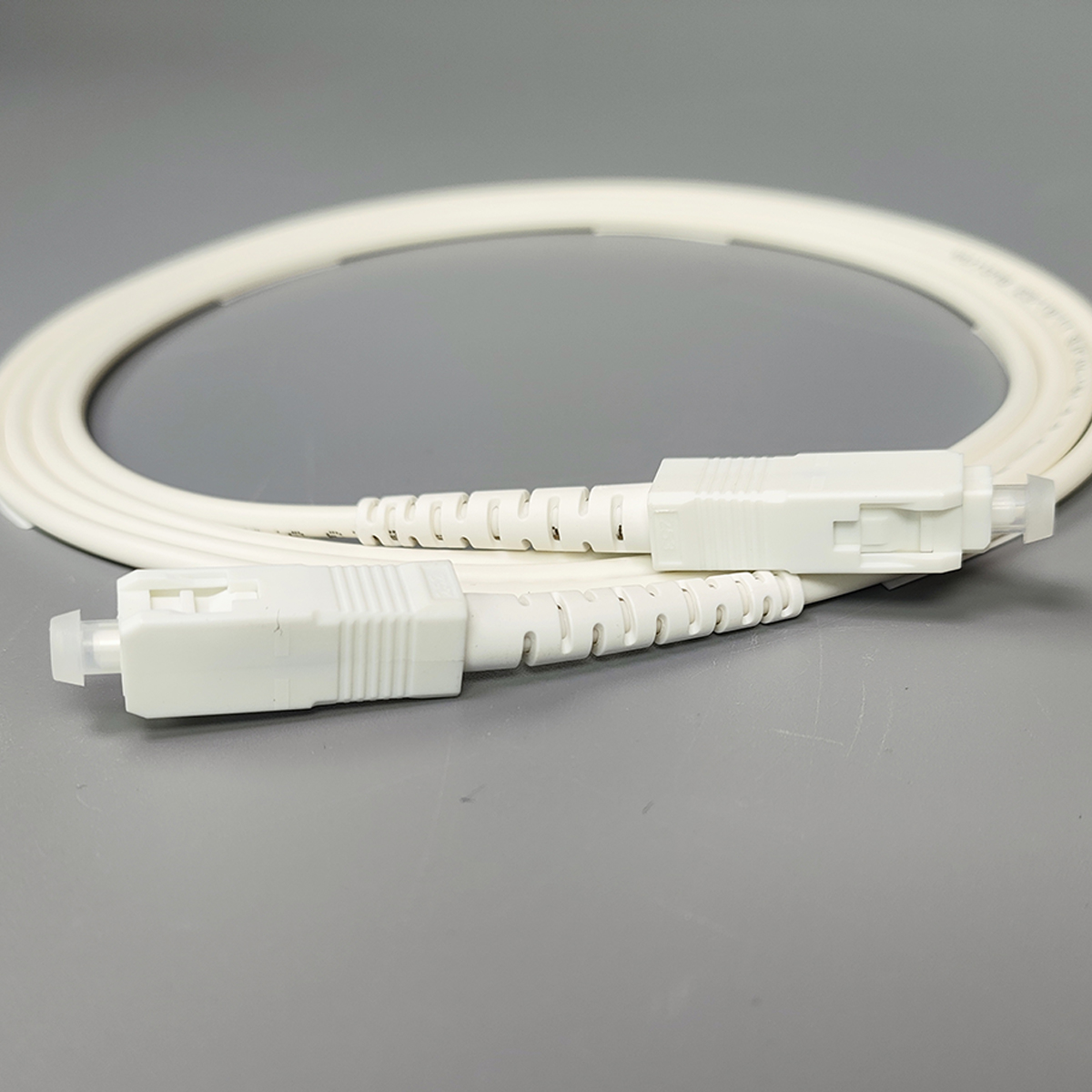 Optical Fiber Patch Cord SC/UPC-SC/UPC Single Mode FTTH White Fiber Optic Internet Cable 