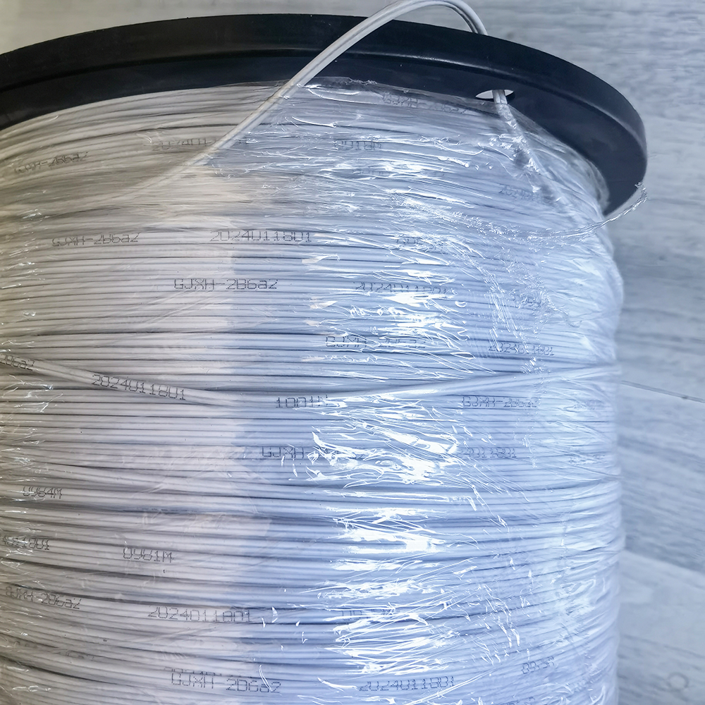 Indoor 1 Simplex Fibra Drop Optic Drop Cable 1000M With Steel Wires One Core Two Steel Wires